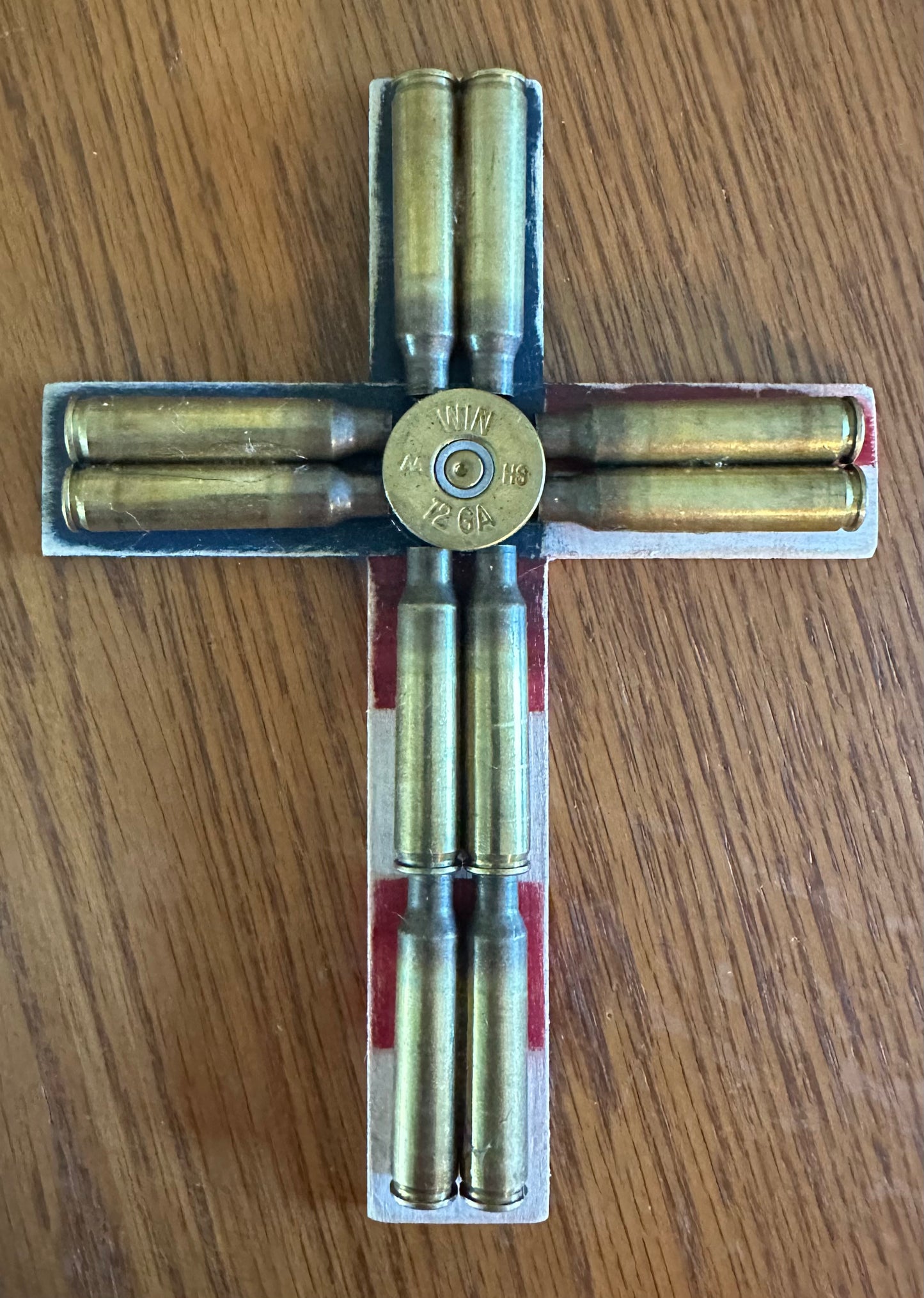 Bullet casing red white blue cross